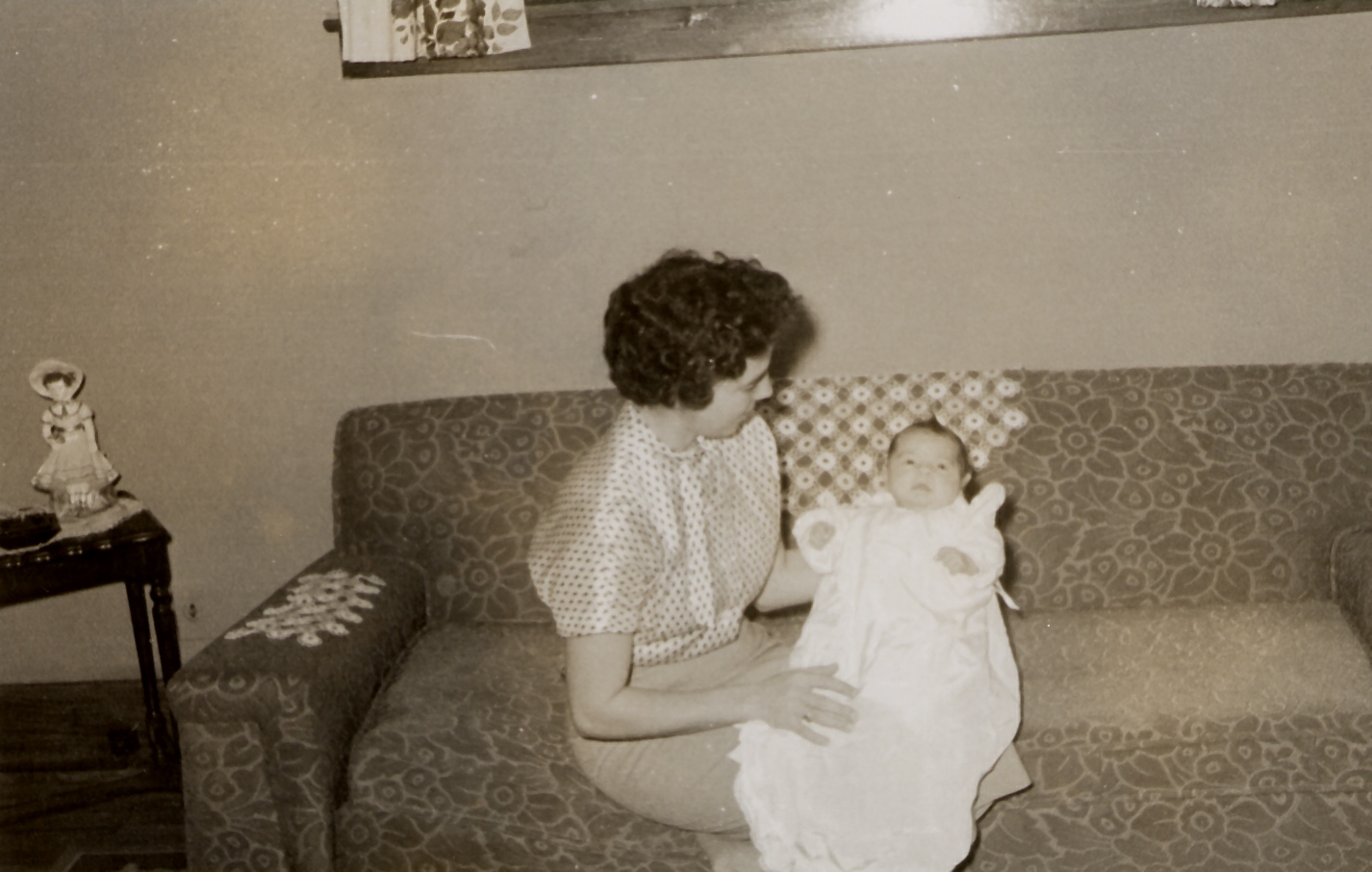 1957. Jenny holding Carol Anne.